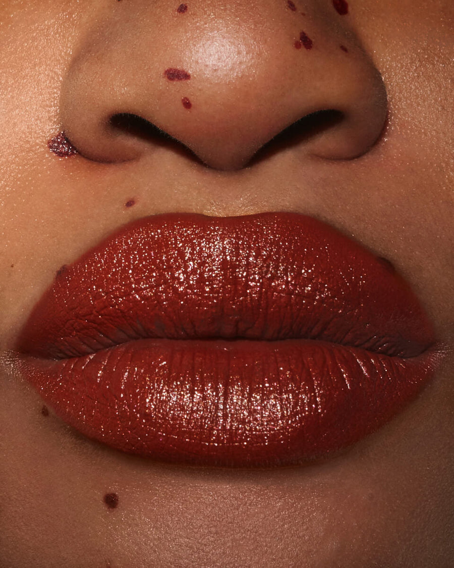 ISAMAYA Wild Star Outlaw lipstick applied on lips